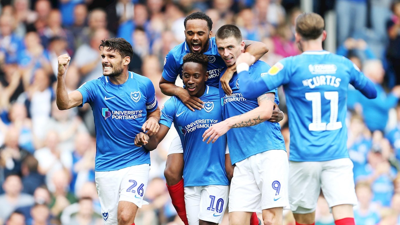 Pompey celebrate scoring against Oxford Unit