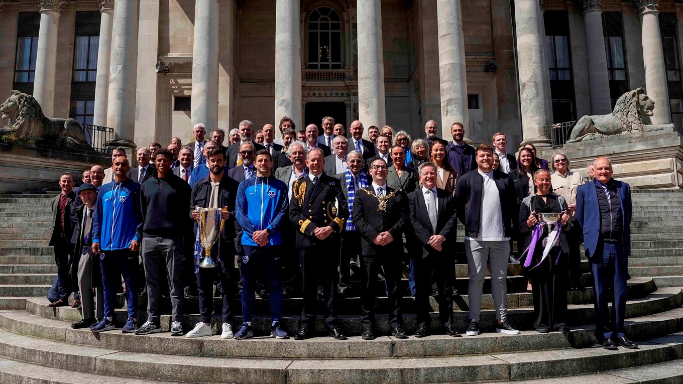 Pompey players, management, staff and volunteers outside the Portsmouth Guildhall ahead of a civic ceremony