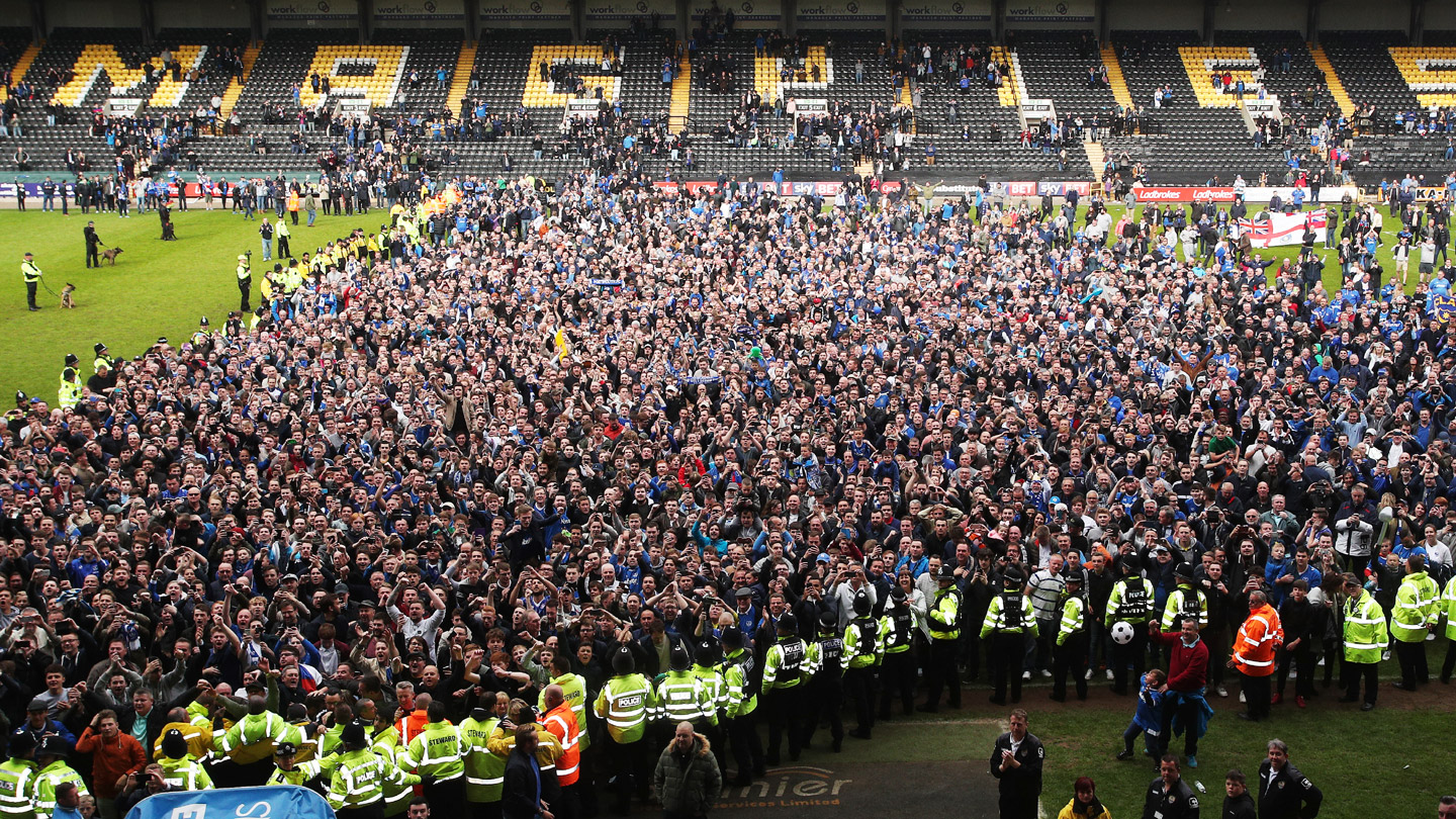 Pompey fans celebrate at Notts County after winning promotion