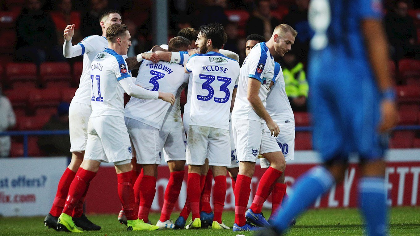 Pompey celebrate scoring at Rochdale in the FA Cup