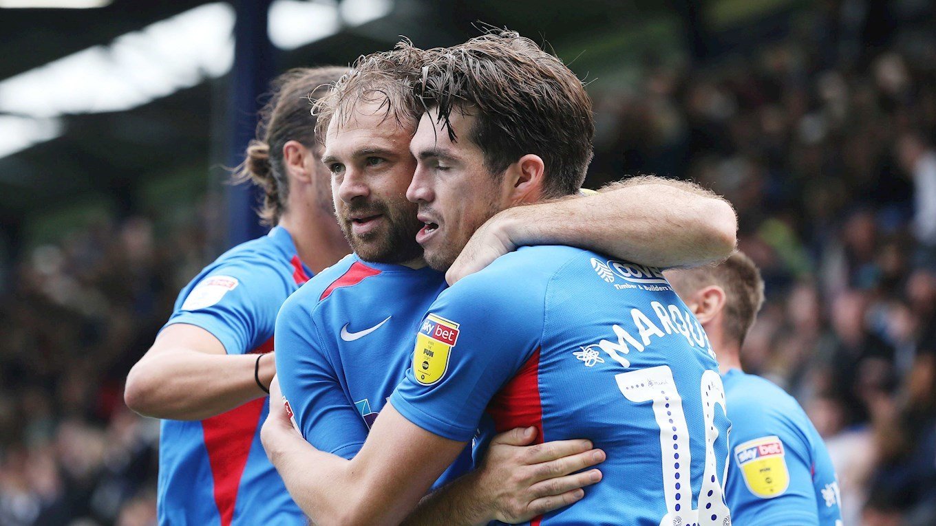Brett Pitman celebrates with John Marquis after scoring for Pompey against Bolton