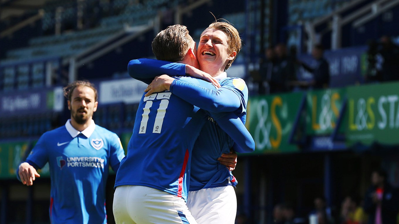 Ronan Curtis and George Byers celebrate after scoring for Pompey against Bristol Rovers