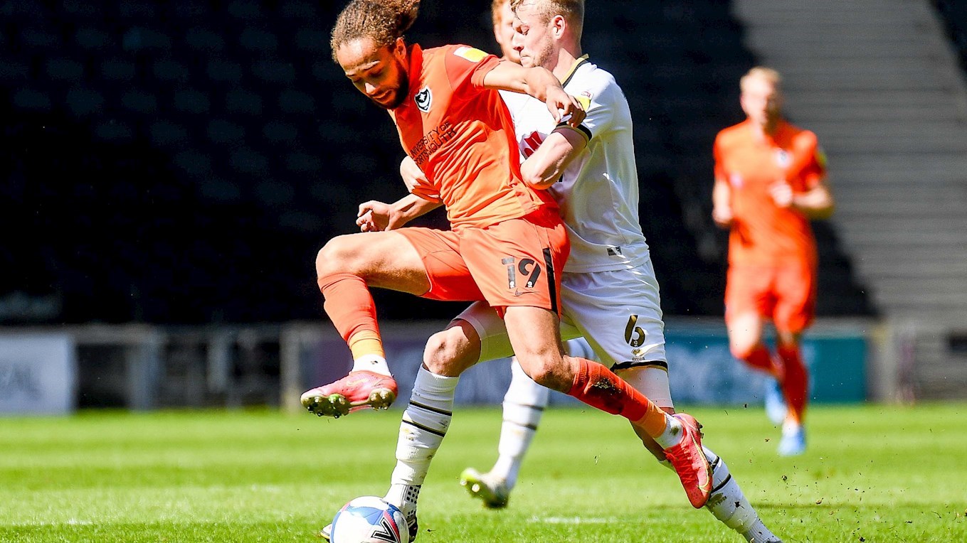 Marcus Harness in action for Pompey at MK Dons