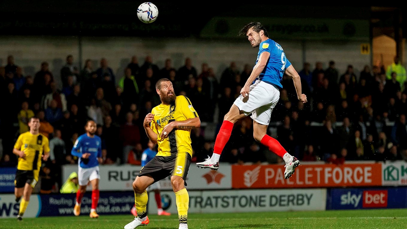 John Marquis in action for Pompey at Burton Albion