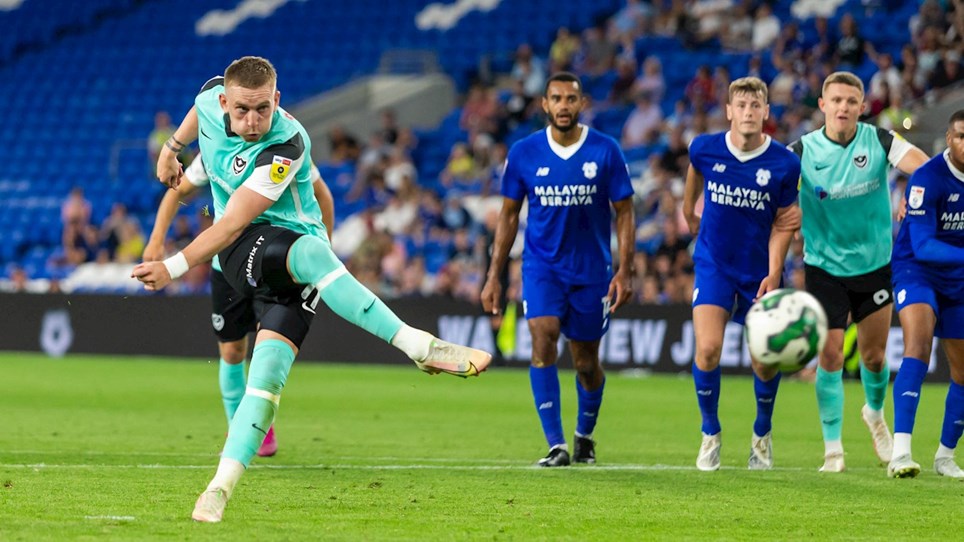 Ronan Curtis scores a penalty for Pompey at Cardiff City