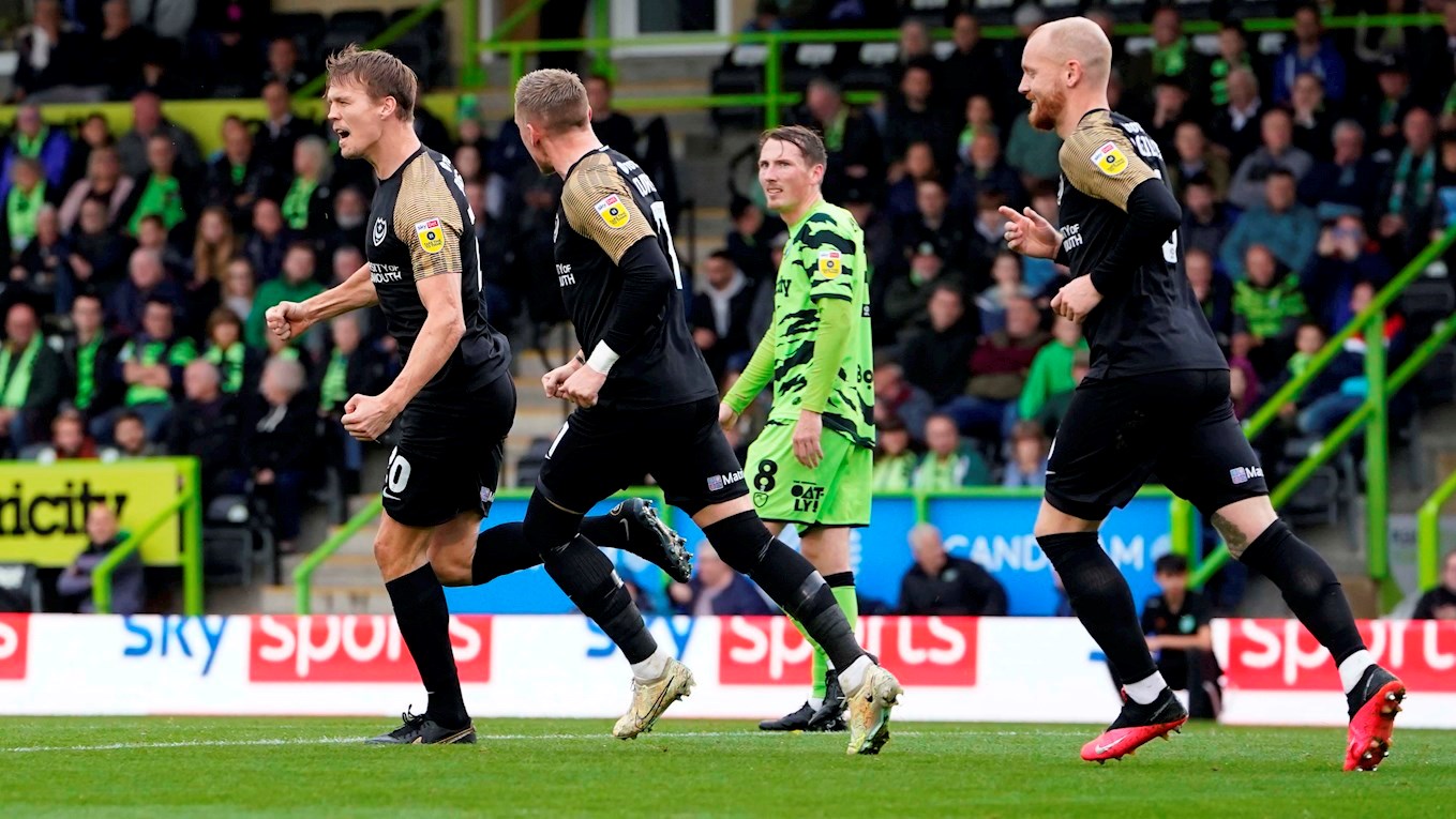 Sean Raggett celebrates scoring for Pompey at Forest Green Rovers