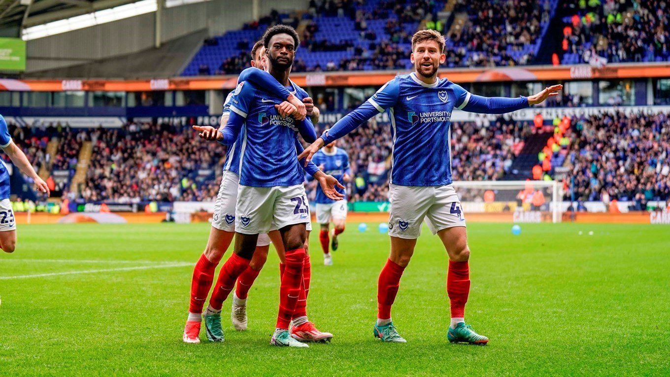 Abu Kamara celebrates scoring for Pompey at Bolton Wanderers
