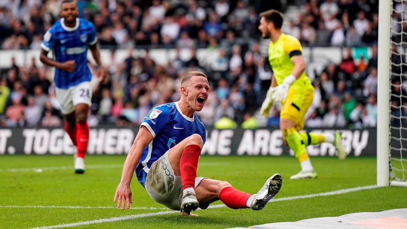 Colby Bishop celebrates scoring for Pompey at Derby County