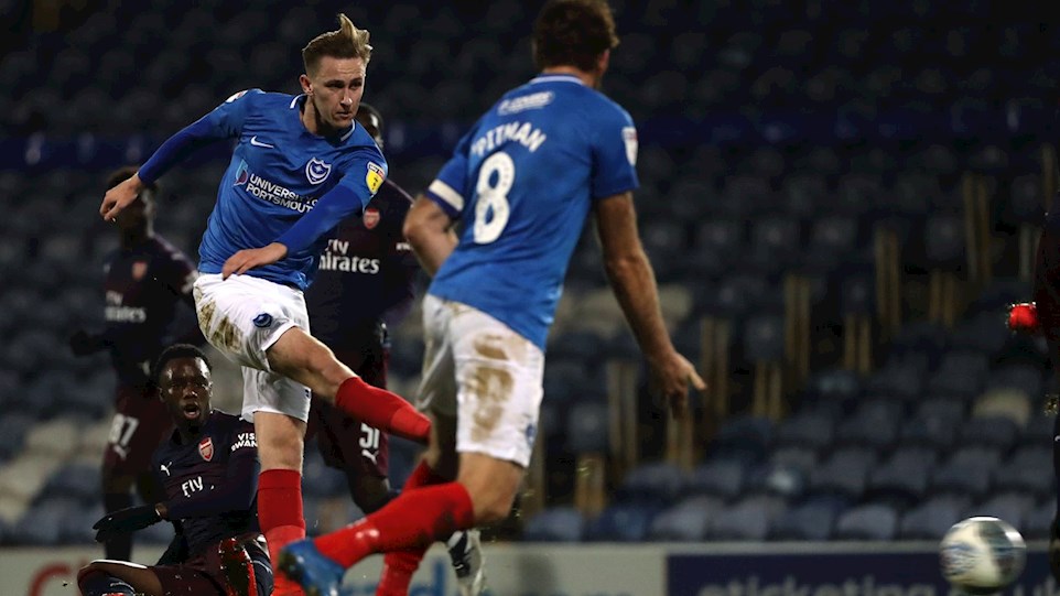 Adam May in action for Pompey against Arsenal
