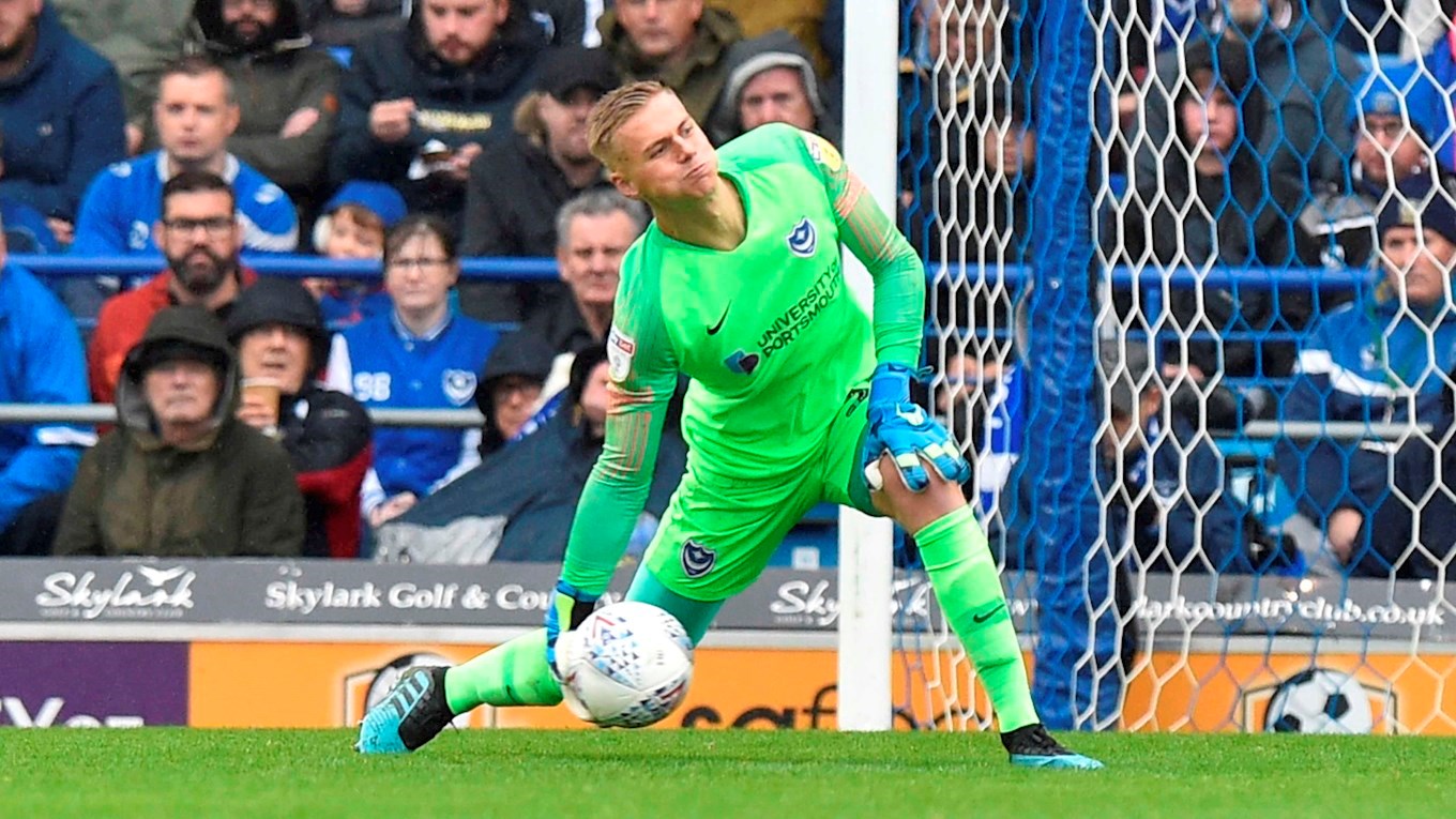 Alex Bass in action for Pompey against Gillingham