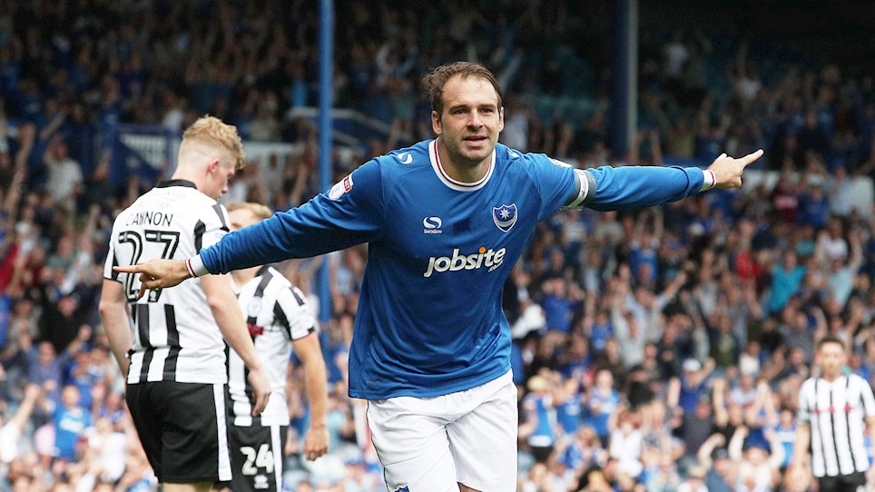 Brett Pitman celebrates scoring for Pompey against Rochdale at Fratton Park in Sky Bet League One