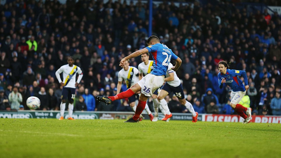 Gareth Evans scores a penalty for Pompey against Oxford