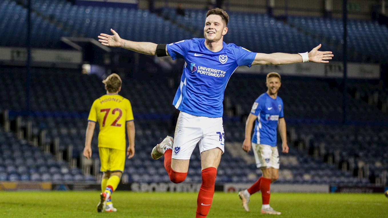 George Hirst celebrates scoring for Pompey against Crystal Palace U21s at Fratton Park in the Papa John