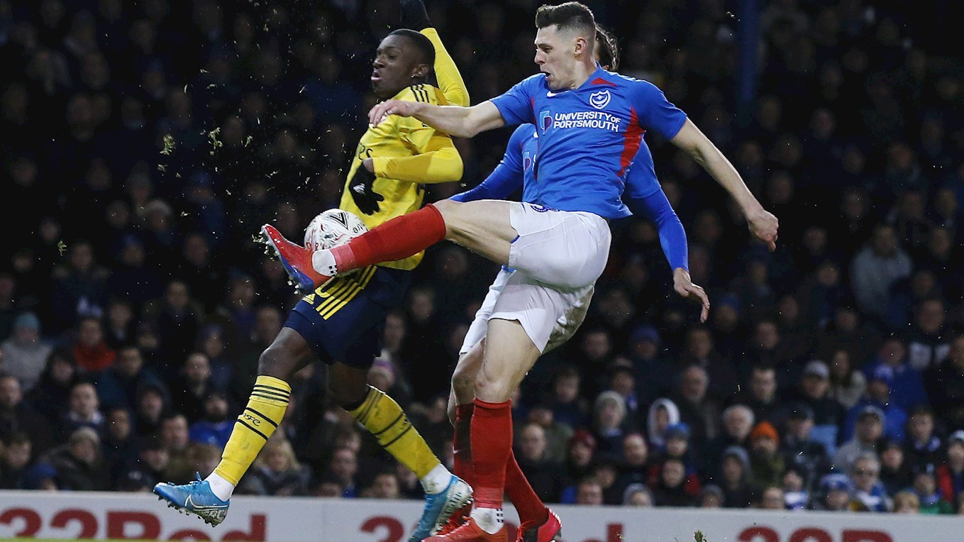 James Bolton in action for Pompey against Arsenal