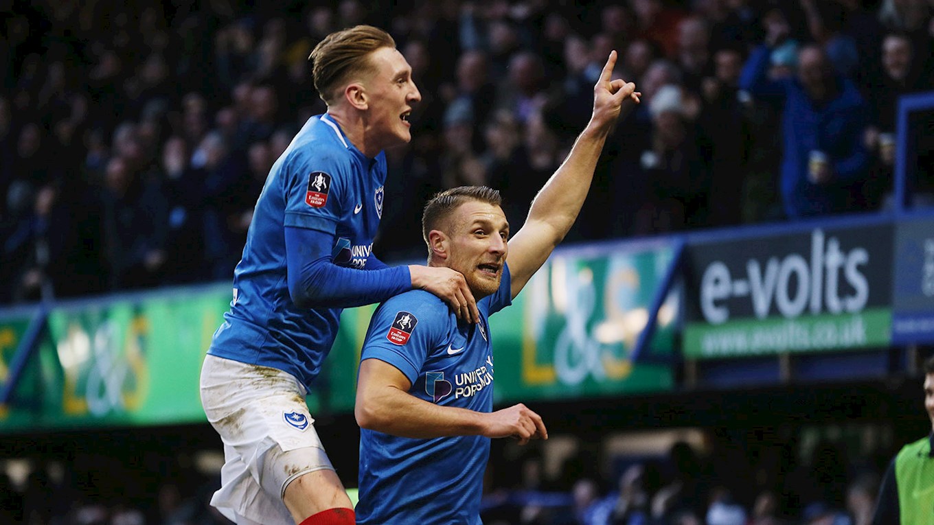 Lee Brown celebrates a Pompey goal with Ro