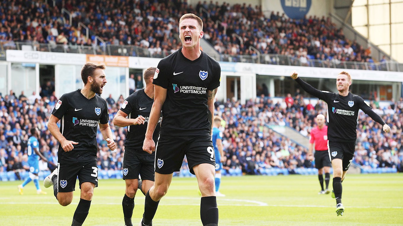 Oli Hawkins celebrates scoring for Pompey at Peterborough United