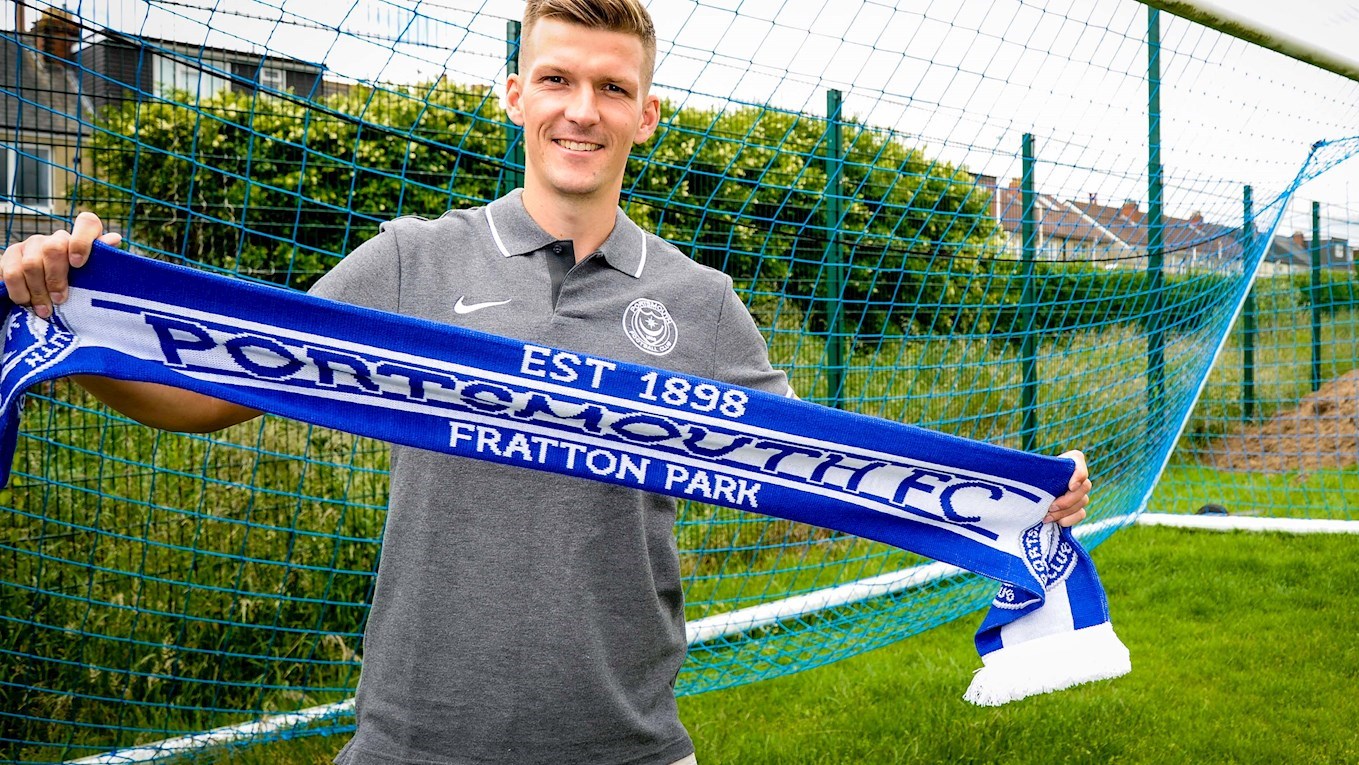 Paul Downing signs for Pompey