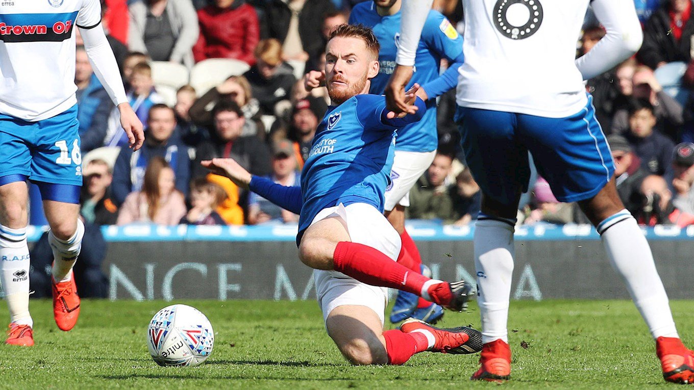 Tom Naylor in action for Pompey against Rochdale