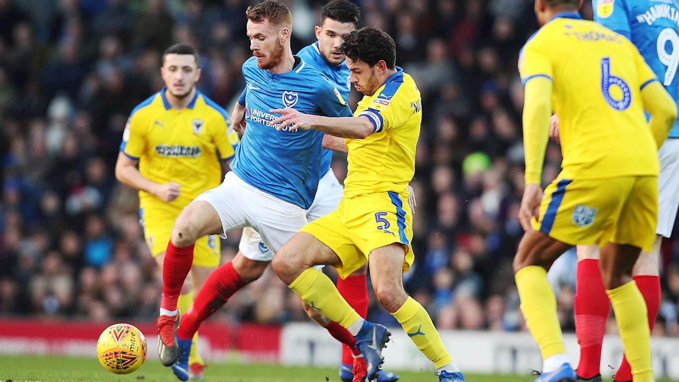 Tom Naylor in action for Pompey against AFC Wimbledon