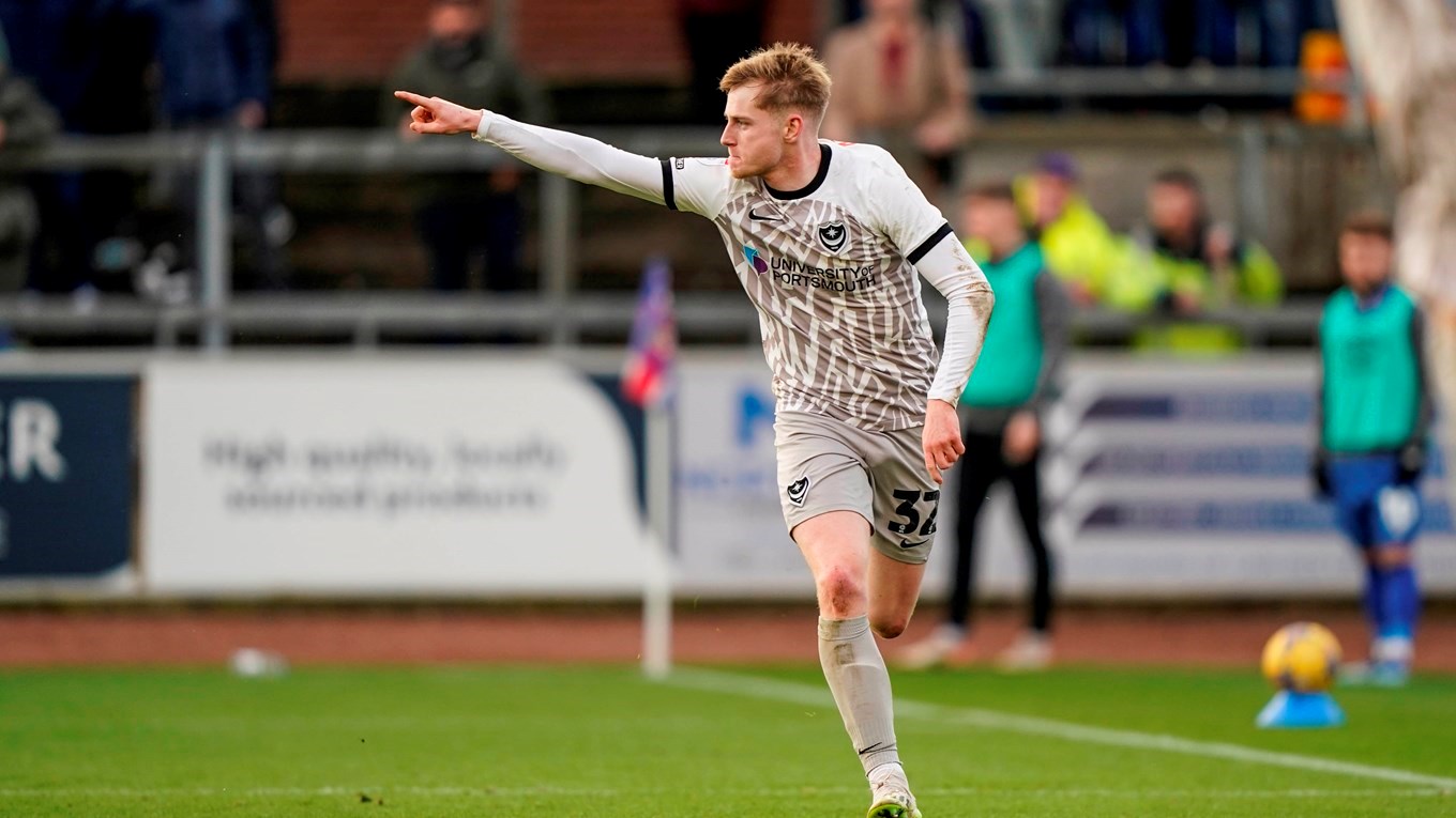 Paddy Lane celebrates scoring for Pompey at Carlisle United