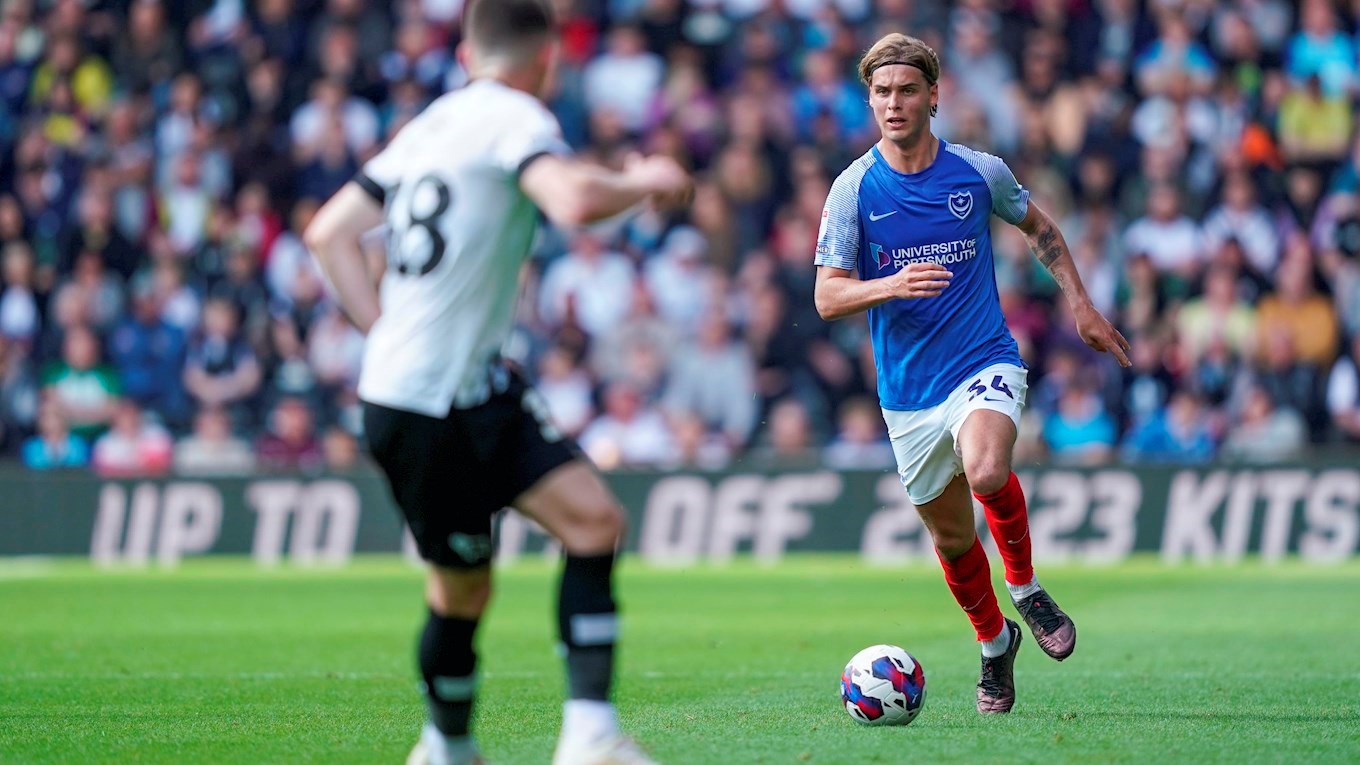Ryley Towler in action for Pompey at Derby County