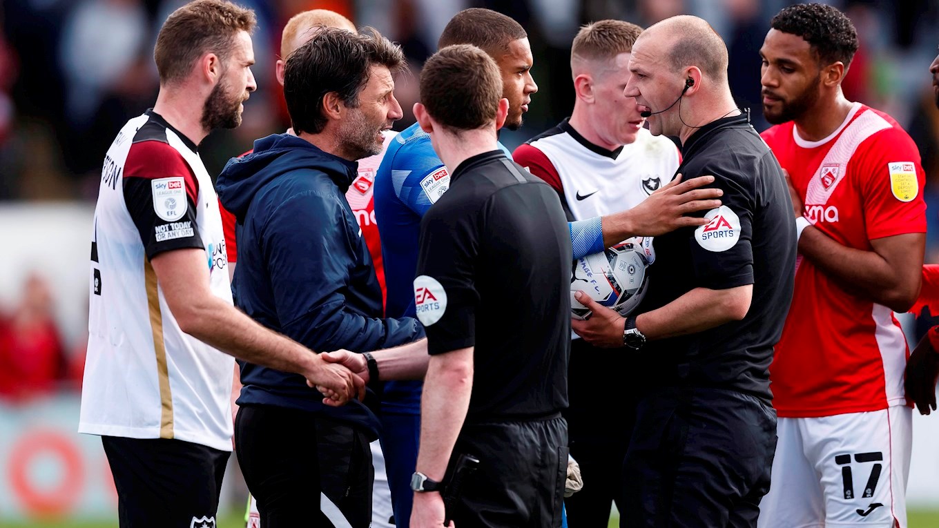 Danny Cowley speaks to the referee after Pompey